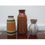 Three West German Pottery floor vases, grey glazed 612-30, treacle glazed 1485-50 and an orange
