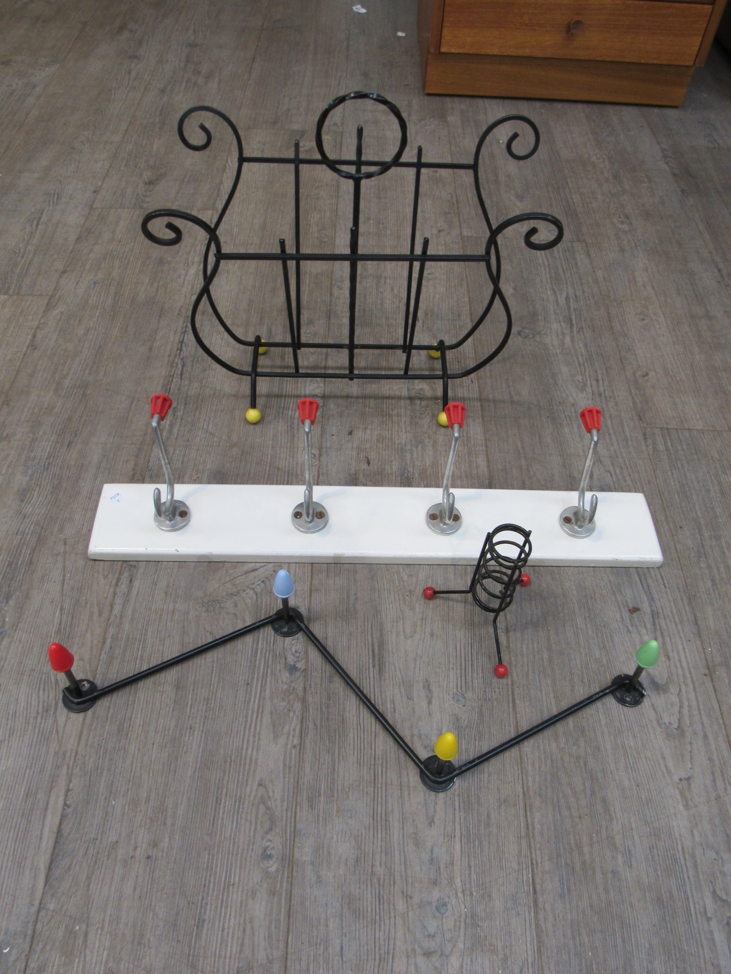 An Atomic/Sputnik style 1950's candle holder, magazine rack and two 1960's wall mounting coat racks. - Image 2 of 2