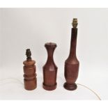 Three mid century turned wooden table lamp bases including teak. Tallest 46cm overall (Collectors