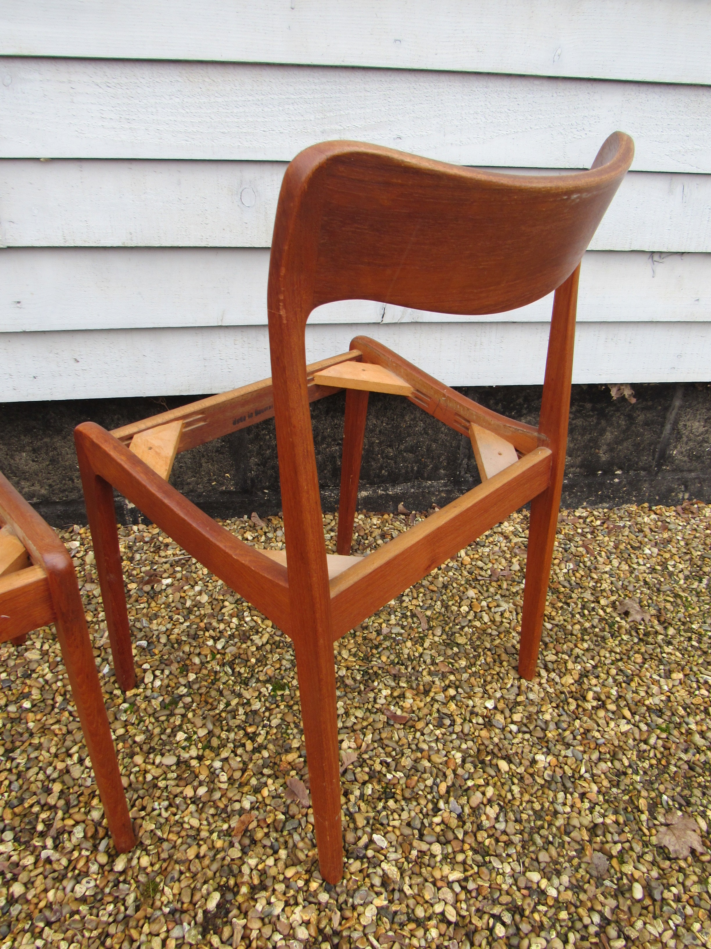 A pair of Danish teak dining chairs, seat pads removed as do not conform with current Fire Safety - Image 4 of 4