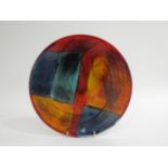 A Poole Pottery 'Gemstones' design shallow dish, Living Glaze range. Marks to base. 26.5cm diameter