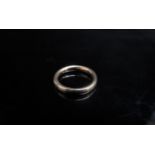 A 22ct gold wedding band. Size N, 7.1g