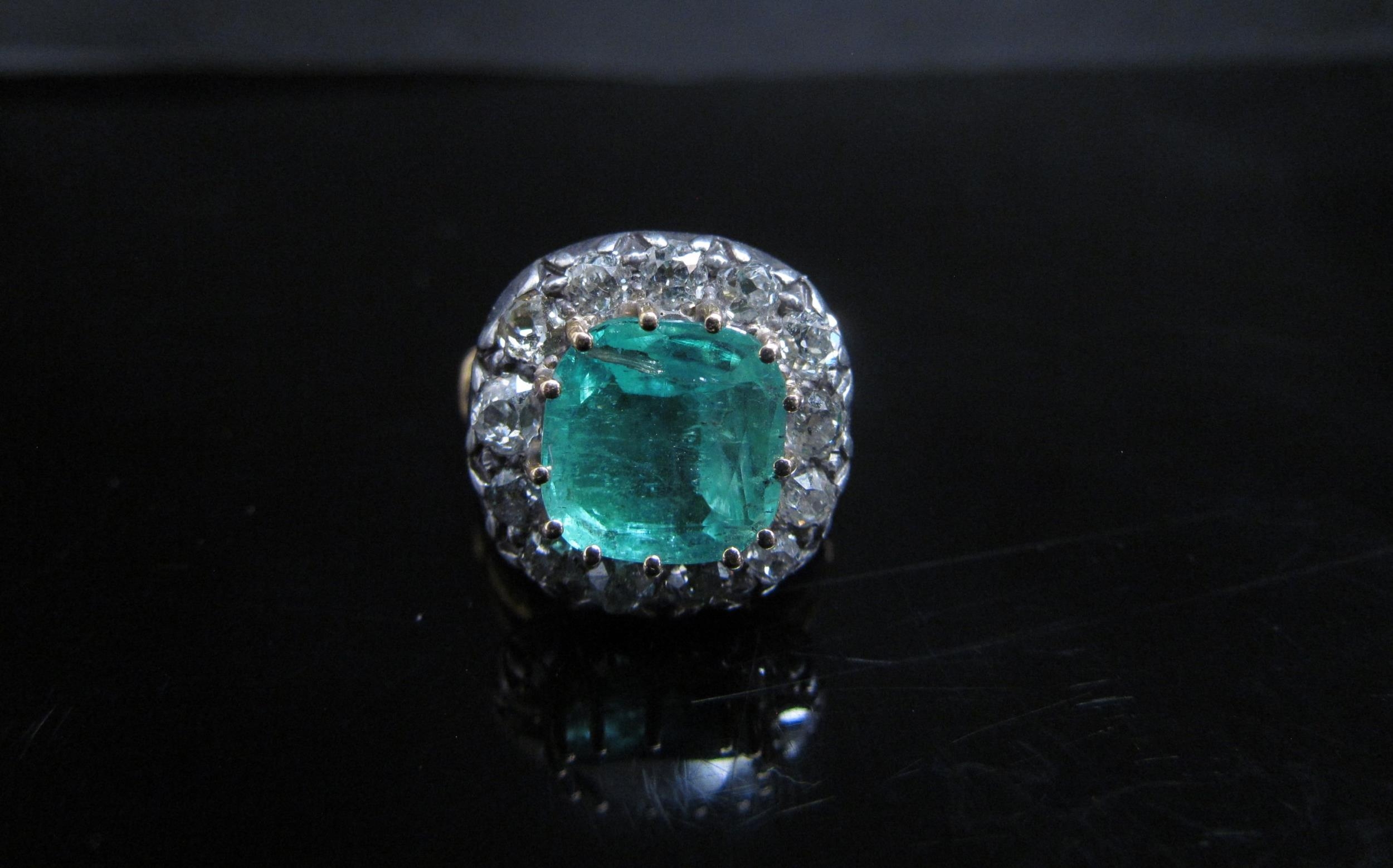 A Georgian emerald and diamond ring, the central emerald 10mm x 10mm framed by thirteen old cut - Image 4 of 5