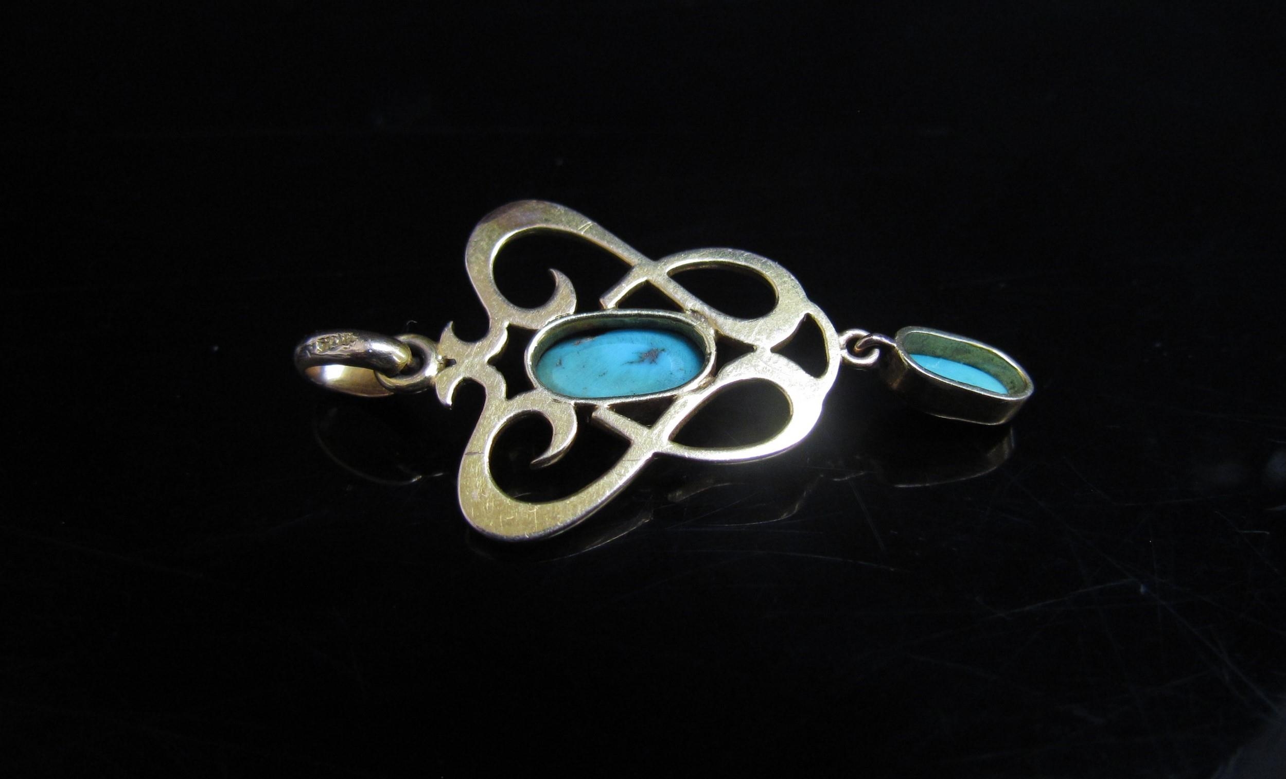 An Edwardian style gold pendant set with an oval turquoise and hung with a turquoise droplet, - Image 2 of 2