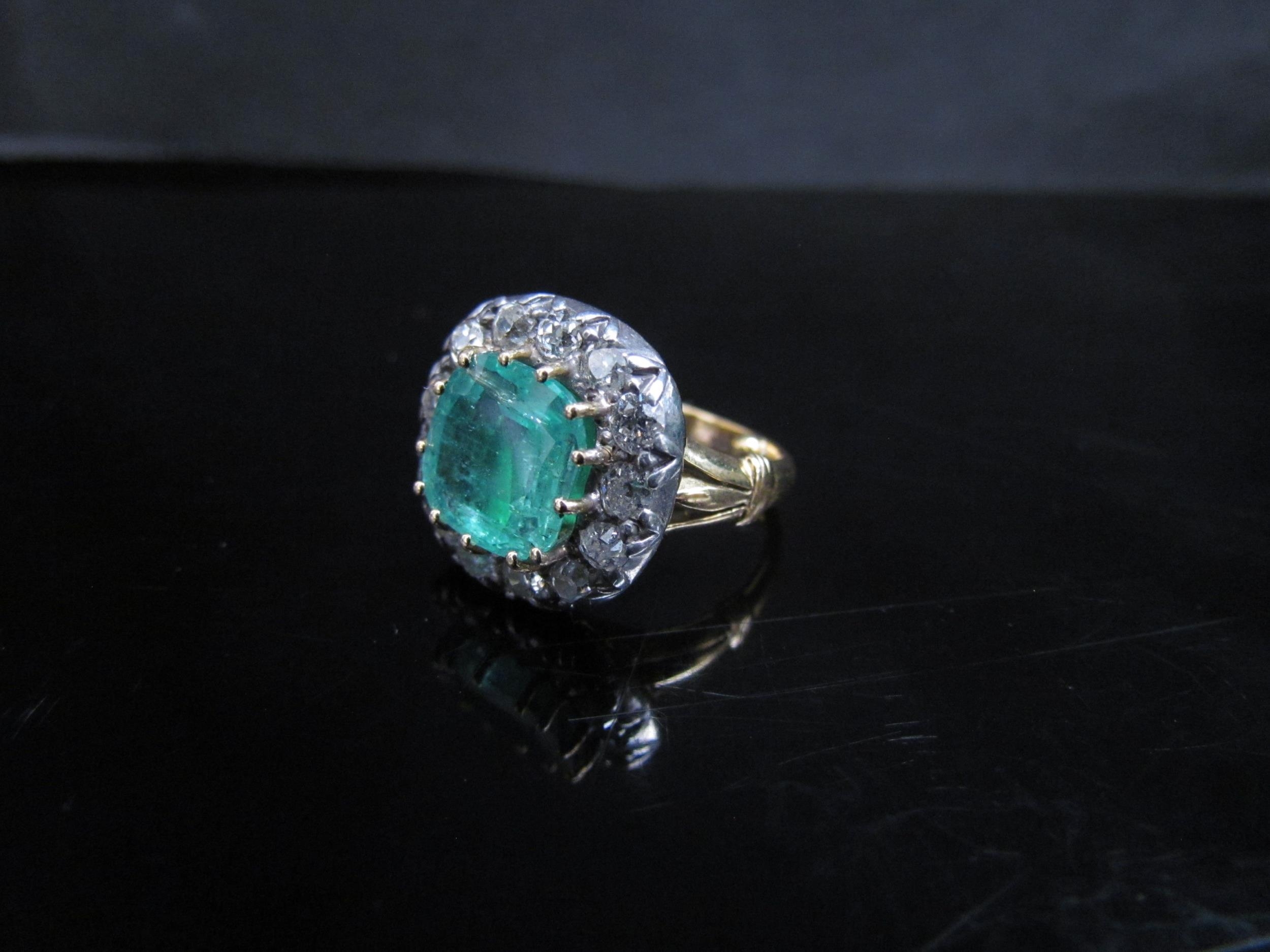A Georgian emerald and diamond ring, the central emerald 10mm x 10mm framed by thirteen old cut - Image 2 of 5