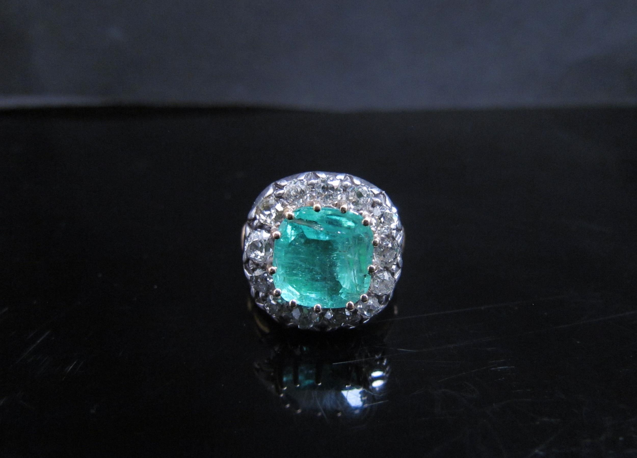 A Georgian emerald and diamond ring, the central emerald 10mm x 10mm framed by thirteen old cut - Image 3 of 5