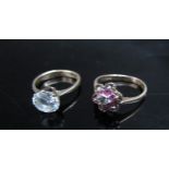 Two 9ct gold rings including ruby and diamond cluster (bent) and a ring set with a clear stone, 4.9g