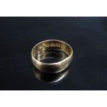 A 22ct gold wedding band. Size J/K, 3.1g