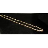 A fancy twist link and ball link neckchain stamped 375, 55cm long, 14.3g