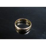 A 22ct gold wedding band. Size J/K, 3.1g