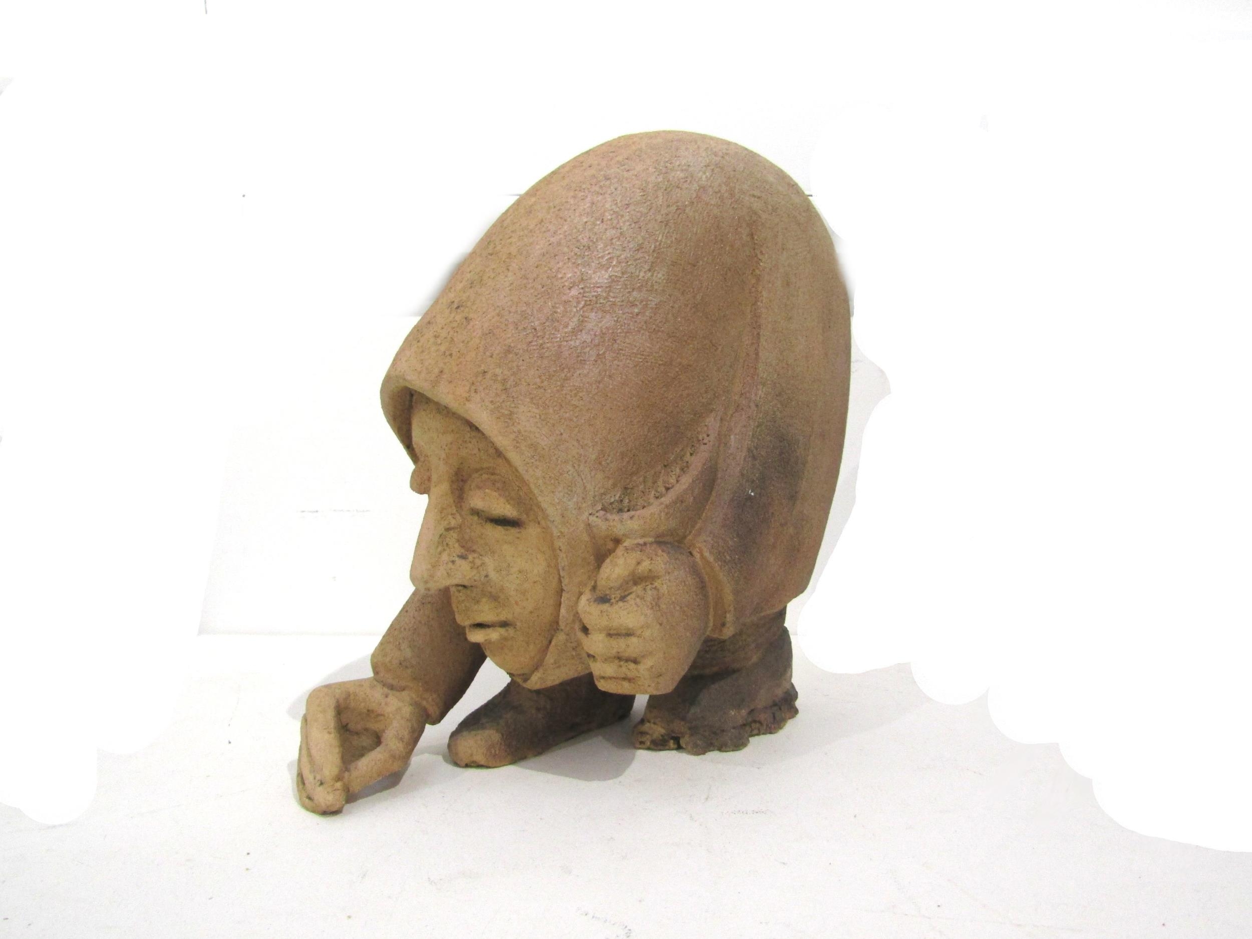 JULIET DYER (1933-2015): A studio pottery figure titled "The Sower". Label to base, 32cm x 32cm x