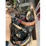A box containing a collection of radio equipment including Hand No.3 microphone and headsets etc