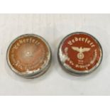 Two tins of original WWII German 'Lederfet' boot dressing, one dated 1940 and the other 1942