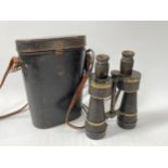 A pair of Imperial German 7xL50 marine binoculars by Leitz, serial number 6870, together with