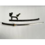 A Japanese sword, the blade appears to be signed Fujiwara Morikuni and circa Shinto / Shinshinto