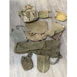 A box of mixed military equipment, including WWII