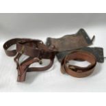 A Sam Browne belt with sword frog, another, and a pair of ARP leather gators