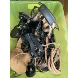A box containing a collection of WWII and later headsets and equipment including US Instrument