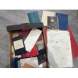 A quantity of WWII officer's ephemera including service documents, photographs, manuals etc, all