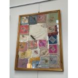 A collection of silk handkerchiefs, framed, 77cm x 58cm