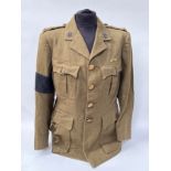 A WWII ATS uniform consisting of blouse and skirt, previously belonging to Florence Smith, who drove
