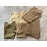 A box containing three pairs of 1949 pattern battledress trousers, service dress trousers 1966 and