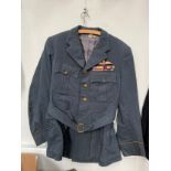 A WWII RAF pilot's jacket with King's crown pilot's wings and brass buttons, medal bar for DFC, AFC,