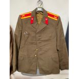 A Soviet Russian officer’s jacket together with a post war German Luftwaffe officer’s jacket (2)