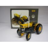 A boxed Universal Hobbies 1:16 scale Massey Ferguson 135 Industrial tractor