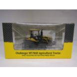 A boxed USK Scale Models 1:32 scale diecast Challenger MT765D Agricultural Tractor