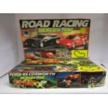 Two Scalextric slot racing sets to include Road Racing and Ford Cosworth (2)
