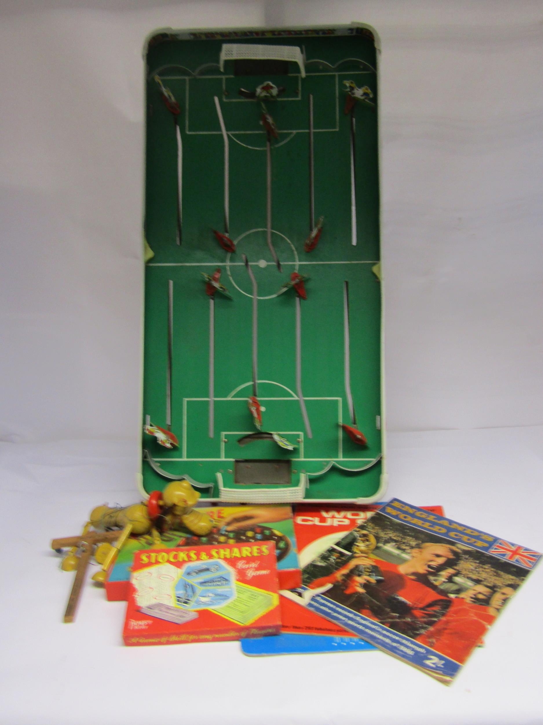 An International Football table football game, unboxed Pelham puppet, games etc