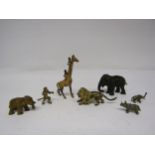 A collection of cold painted bronze and other metal figures of exotic animals to include giraffe