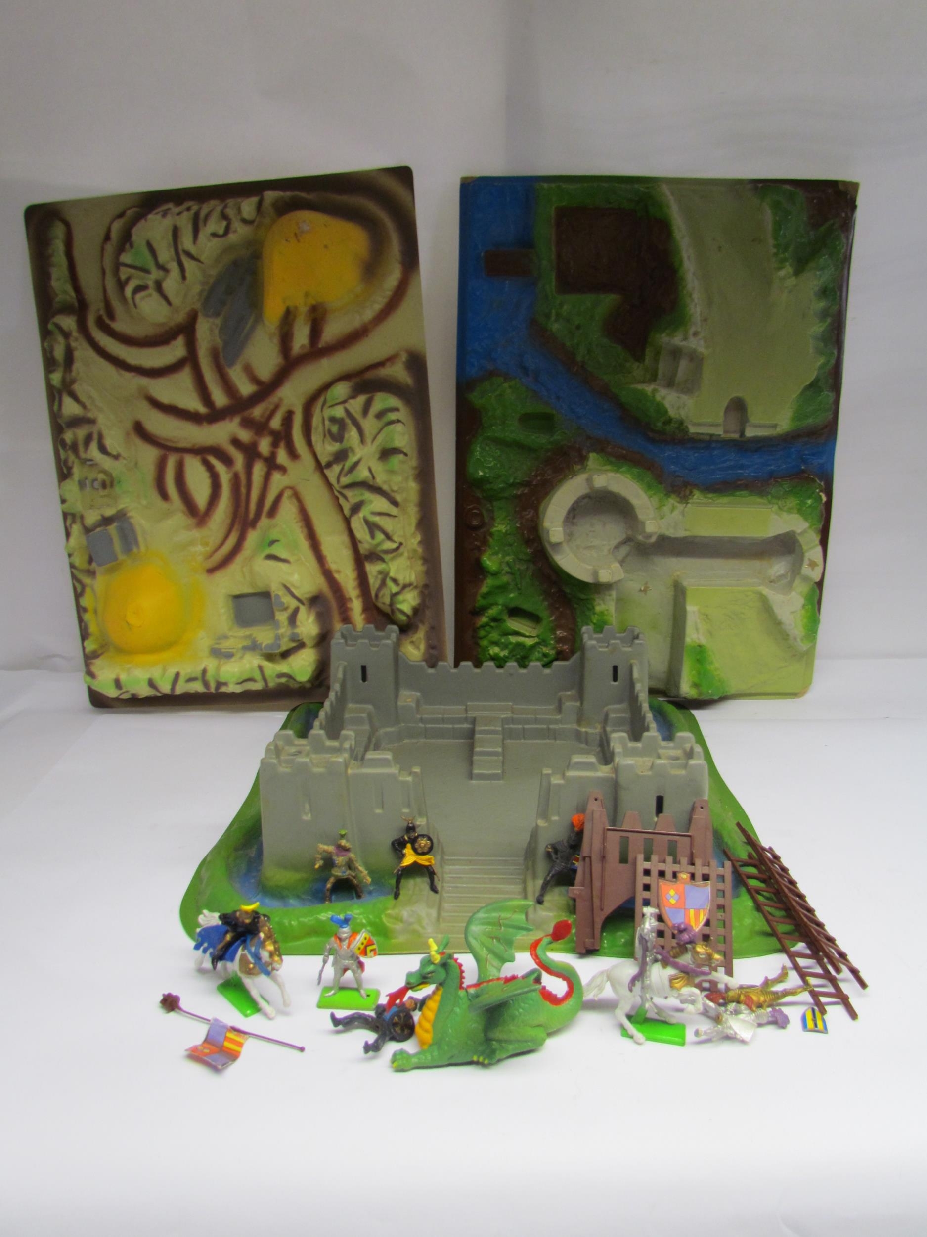 A Britians castle playset with assorted figures and two additional bases