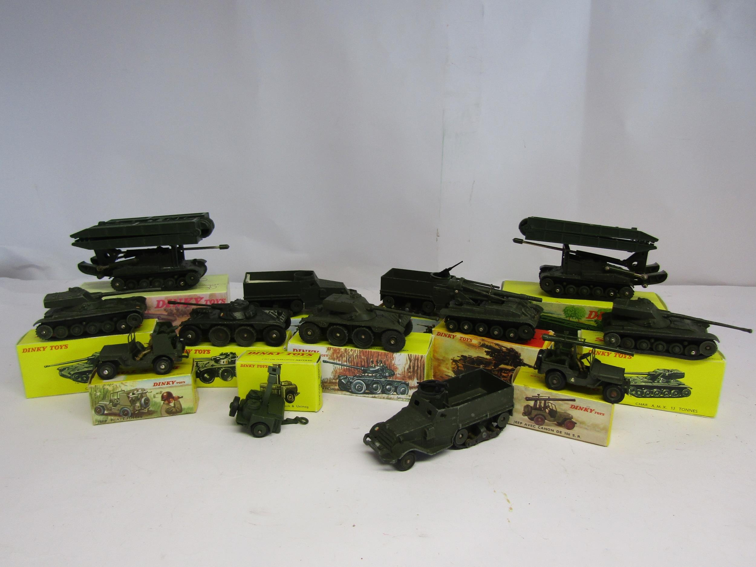 A collection of French Dinky diecast military vehicles to include 883 Char AMX (x2), 80A EBR