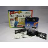 A boxed Levitron Omega Amazing Anti-Gravity Top and Electronic Geosafari Jr educational game (2)