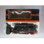 A boxed Newqida, China, radio controlled G scale locomotive, with remote control