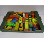 A box of assorted diecast construction vehicles including Corgi and Dinky