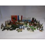 A collection of playworn lead and plastic soldiers and other figures including Britains Deetail
