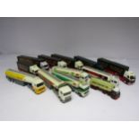 A collection of diecast model container trucks including including Corgi Eddie Stobart, Esso, BP etc