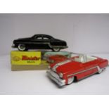 A boxed Minister Delux saloon car and unboxed red convertible (2)