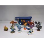 A collection of Skylanders Giants figures and cards with associated carry case