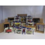 A collection of boxed Oxford Diecast model buses and trucks (66)