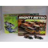 A Scalextric Mighty Metro slot racing set (cars replaced with Formula 1 cars) and an Artin