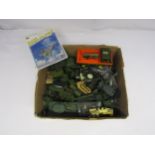 A collection of diecast military vehicles, tanks, guns and code 3 examples