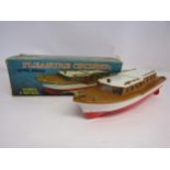 A boxed battery operated Pleasure Cruiser plastic model boat, made in Hong Kong
