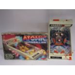 A boxed Tomy Atomic Pinball game