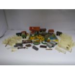 A collection of predominantly Britains plastic farm buildings animals, figures and accessories and a