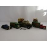 Four unboxed Triang Minic clockwork vehicles to include armoured car (damaged), two Minic