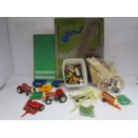 A Britains plastic farmyard base with assorted animals, figures, vehicles, etc